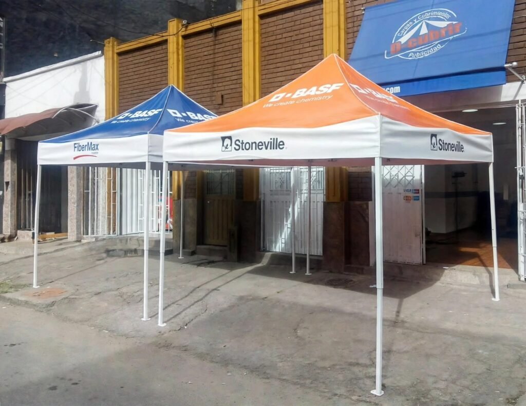 Kiosco publicitario y carpa con impresión de marca en Bogotá - Carpas De Cubrir