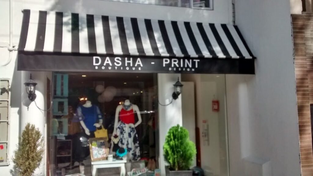 Toldo fijo o parasol de fachada para local comercial en Bogotá - Carpas De Cubrir